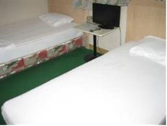 Yoshida Hotel Okinawa Quarto foto